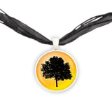 Leafy Oak Tree Silhouette w/ Sunny Yellow Background Pendant Necklace in Silver Tone