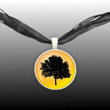 Leafy Oak Tree Silhouette w/ Sunny Yellow Background Pendant Necklace in Silver Tone