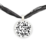 Random Foot Prints on White Background Pendant Necklace in Silver Tone