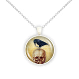Black Raven or Crow Perched on Red Skull Vintage Style Artwork 1" Pendant Chain Necklace in Silver Tone or Gold Tone