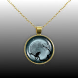 Cat Licking Paw in Tree Against Blue Tinted Moon Autumn & Halloween Illustration Art 1" Pendant Necklace in Gold Tone