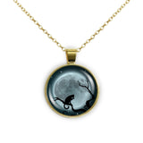 Cat Licking Paw in Tree Against Blue Tinted Moon Autumn & Halloween Illustration Art 1" Pendant Necklace in Gold Tone
